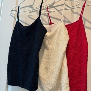 Ann Taylor Factory lace overlay camisoles. Navy, ivory and pinkish red.